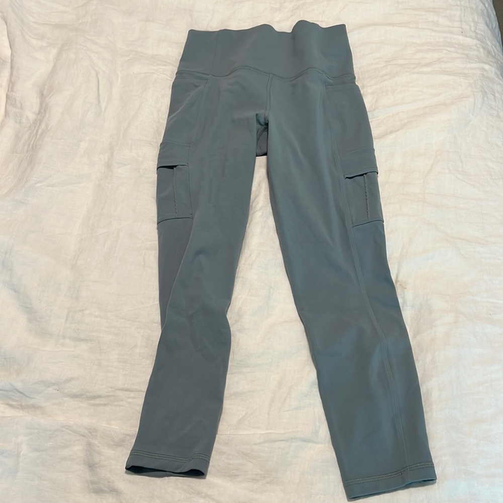 pretty green teal Althleta size small with pockets